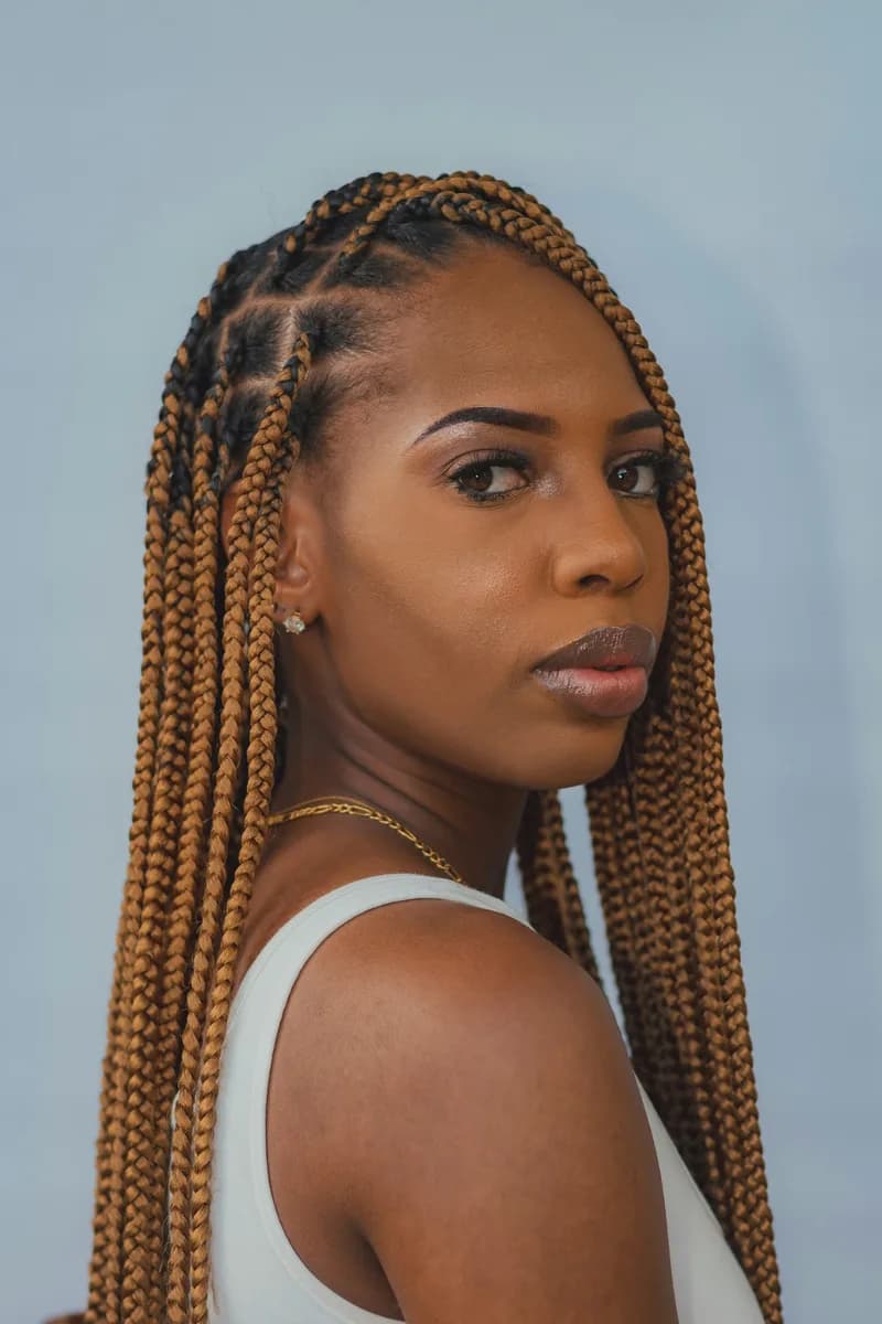 Long box braids cut to shoulder length